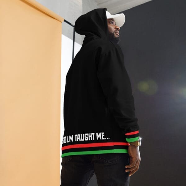 Wearer of black power sweatshirt posing