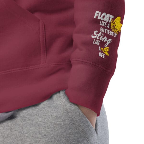Maroon hoodie featuring Muhammad Ali, a piece of Black history apparel.