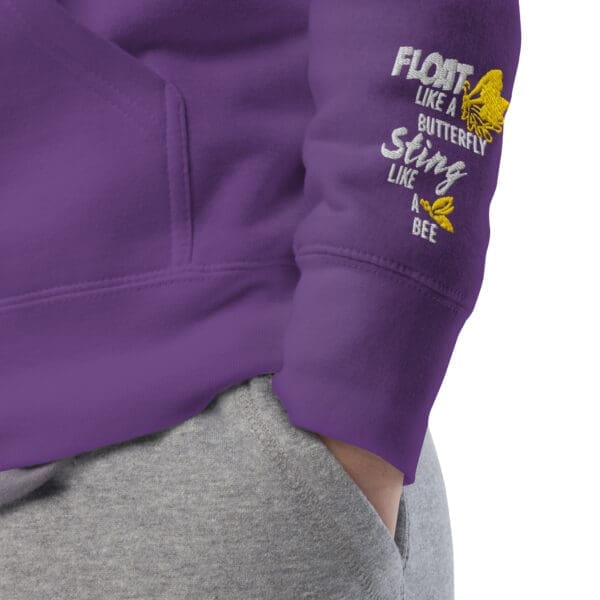 Purple hoodie featuring Muhammad Ali, a piece of Black history apparel.