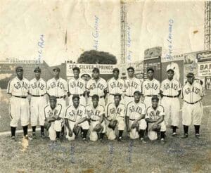 Historic 1930s team portrait of the Homestead Grays Negro League baseball team, featuring players in uniform posed before a game during their championship rise.