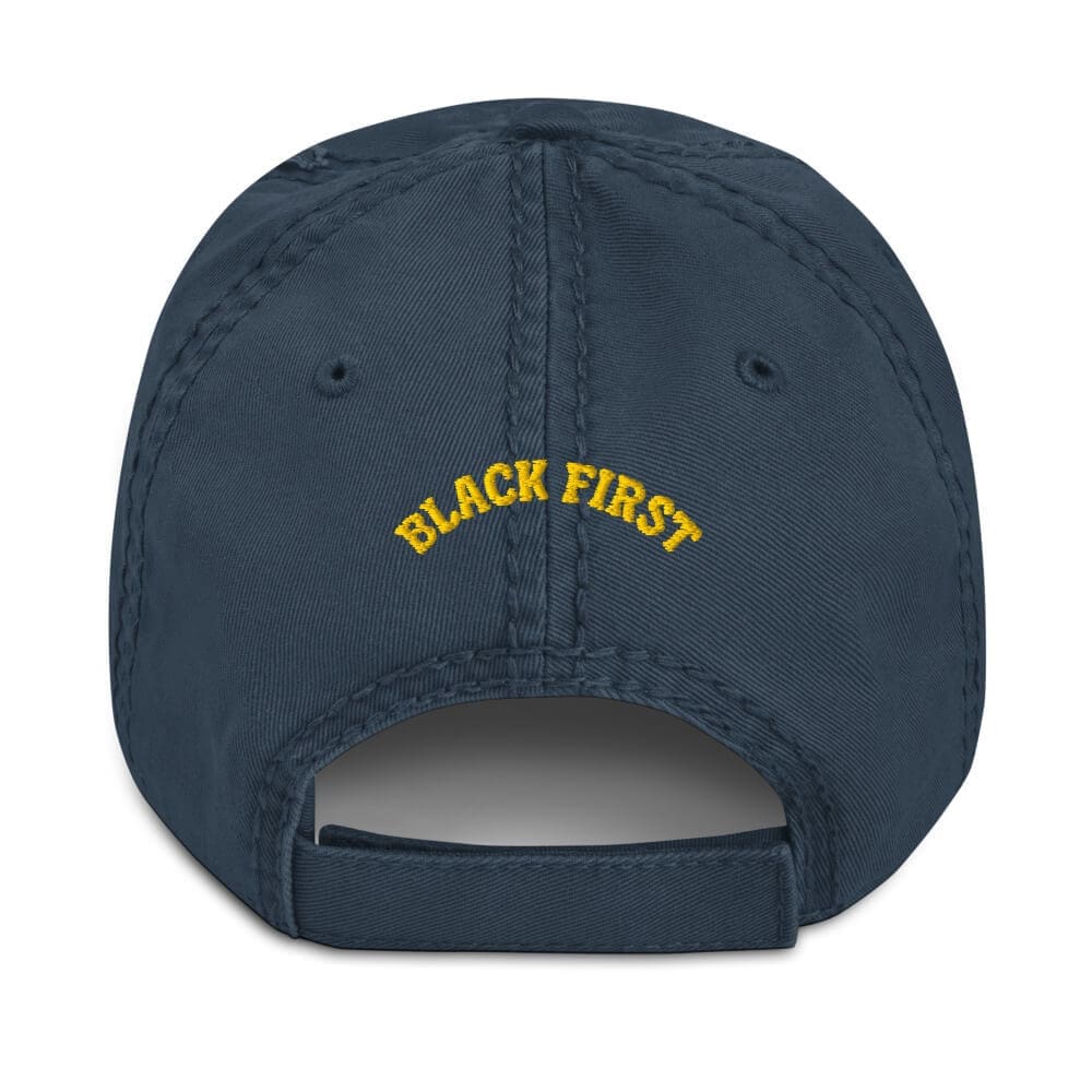 Back of the navy distressed dad hat from B1Clothing Co. with "Black First" embroidered in gold.